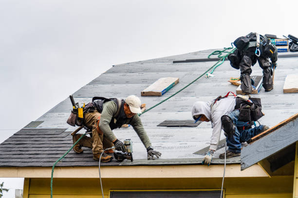 Professional Gutter Installation technician working in Winchester, KS